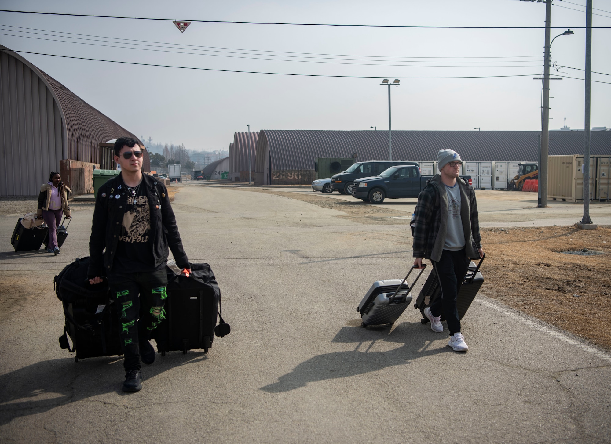 U.S. Air Force augmentees for exercise Freedom Shield 25 carry their luggage to contingency lodging at Osan Air Base, Republic of Korea, March 1, 2025.