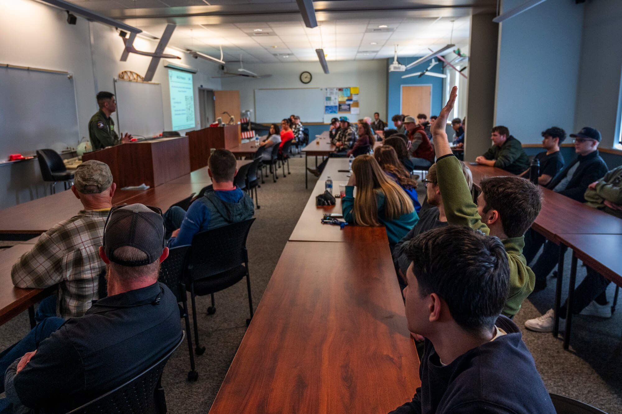 U.S. Air Force Maj. Nelson Liu, 62d Airlift Wing chief of flight safety, answers questions during a midair collision avoidance brief given to Big Bend Community College aviation program students in Moses Lake, Washington, March 7, 2025.