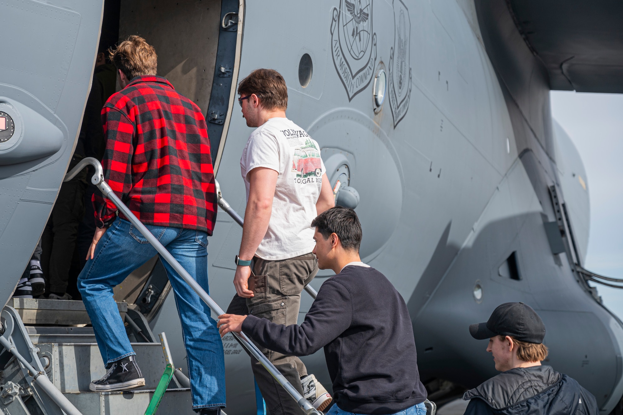Students from the Big Bend Community College aviation program tour a 62d Airlift Wing C-17 Globemaster III after a McChord Flight Safety Office midair collision avoidance brief in Moses Lake, Washington, March 7, 2025.