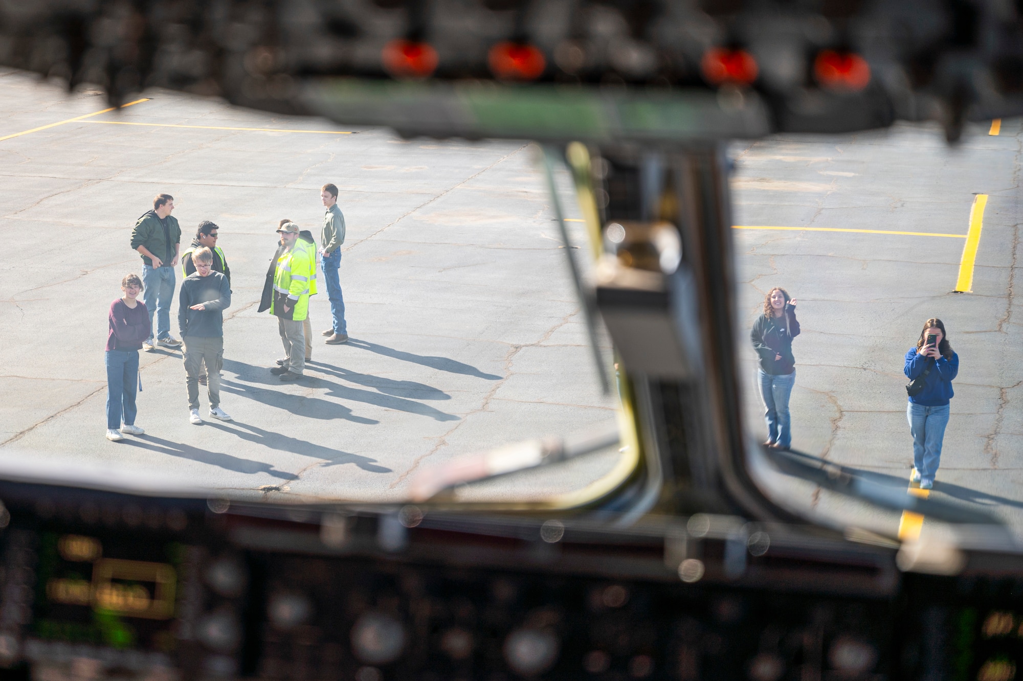 Students from the Big Bend Community College aviation program observe and photograph a 62d Airlift Wing C-17 Globemaster III after a McChord Flight Safety Office midair collision avoidance brief in Moses Lake, Washington, March 7, 2025.