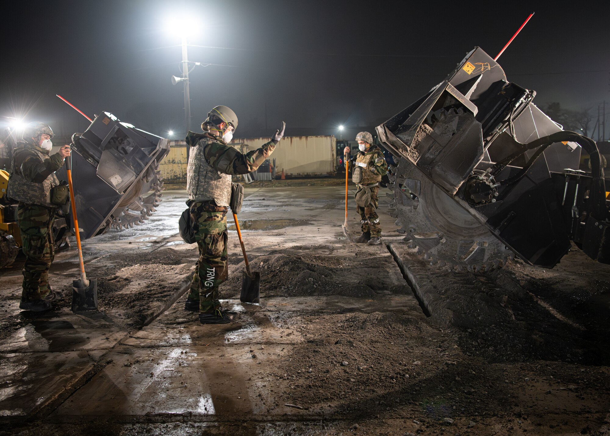 airman clear debris for a Rapid Airfield Damage Recovery