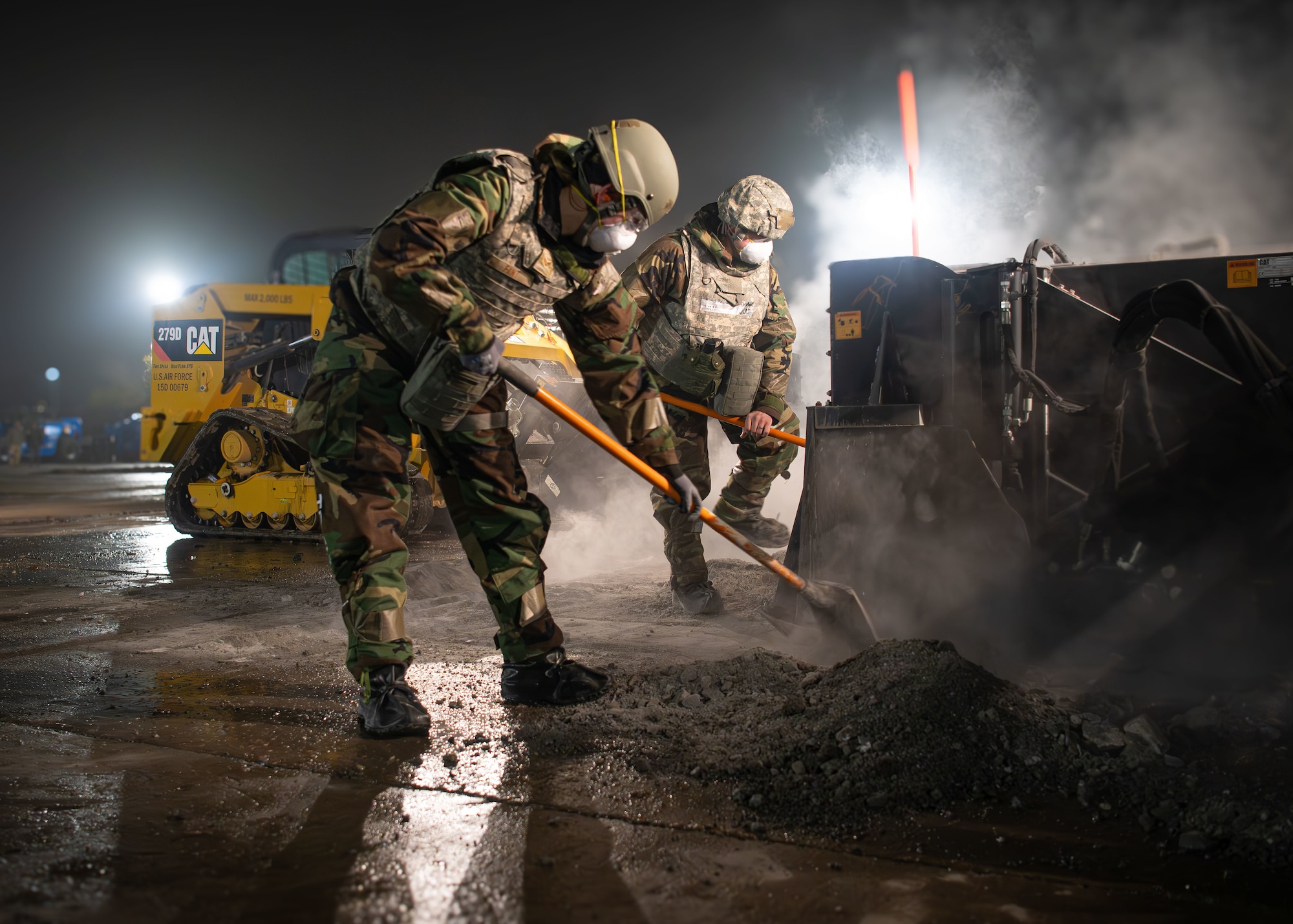 374th Civil Engineer Squadron clear debris