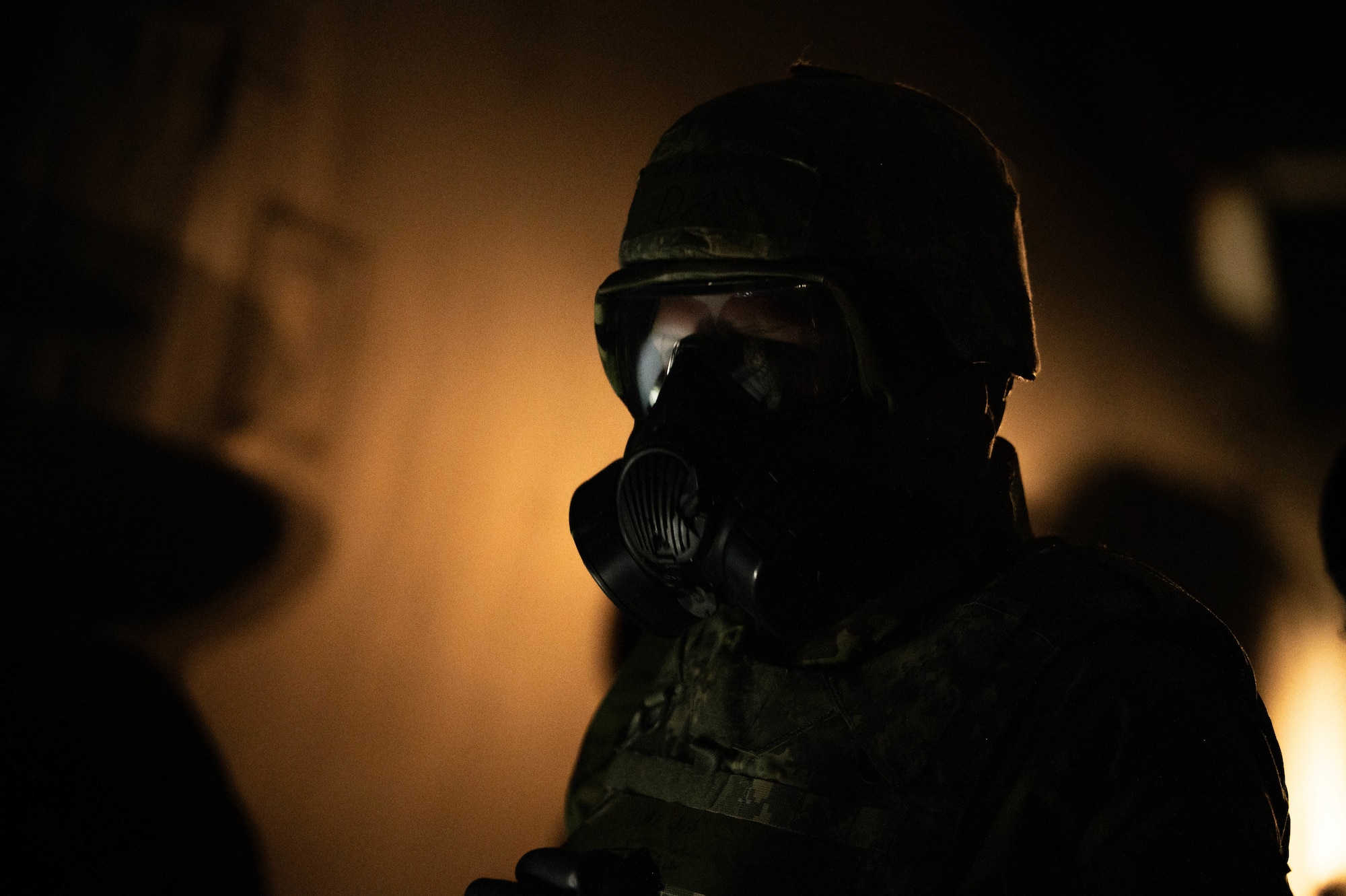 Airmen perform decontamination of the aircrew and aircraft.