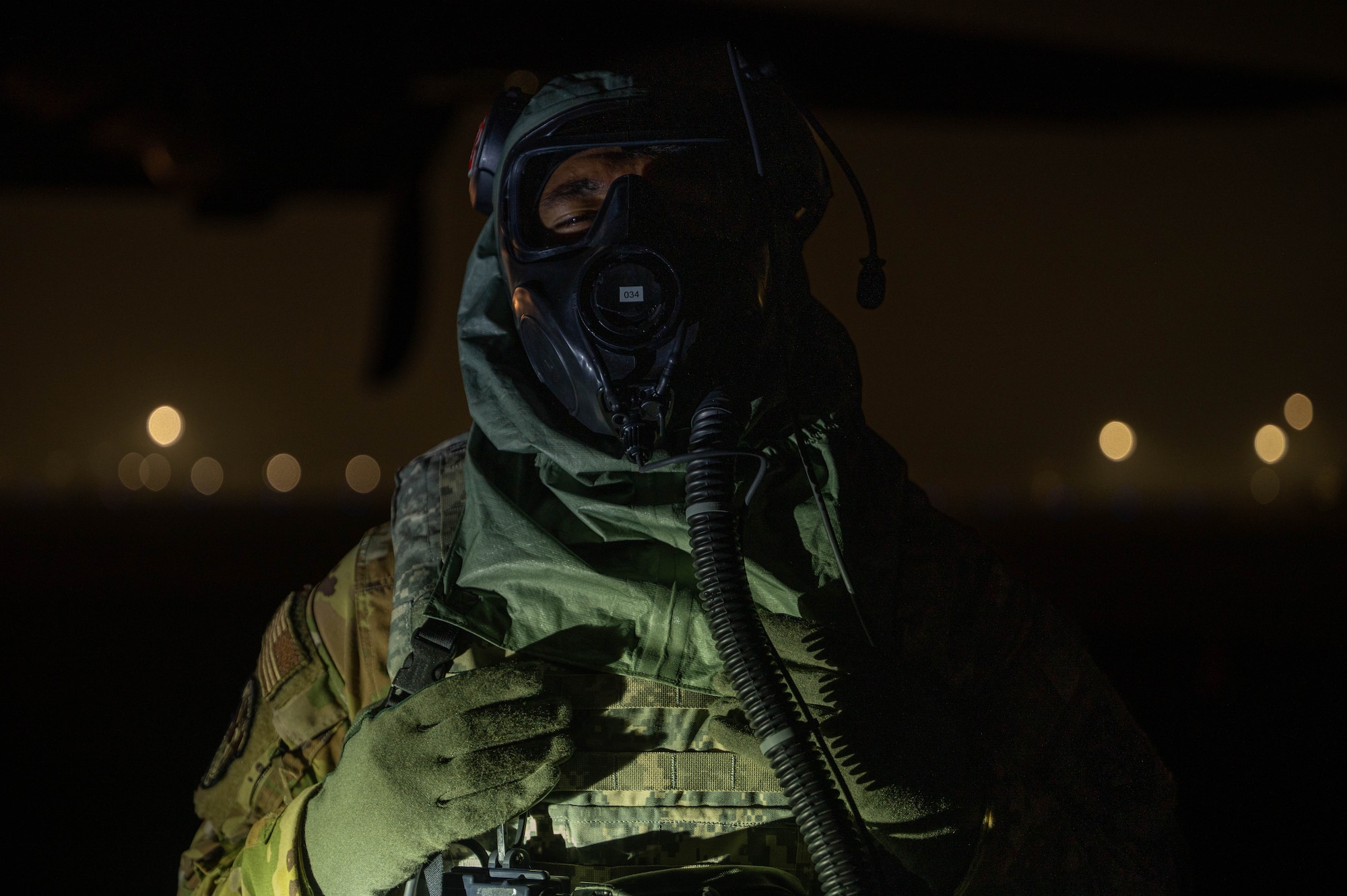 Airmen perform decontamination of the aircrew and aircraft.