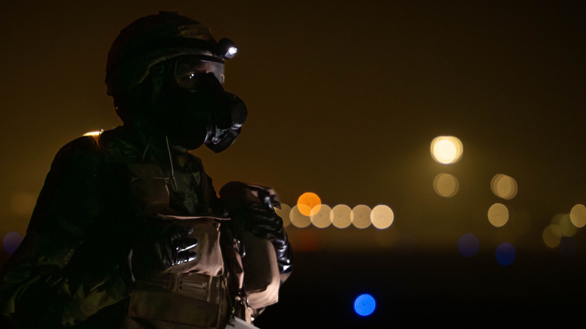 Airmen perform decontamination of the aircrew and aircraft.