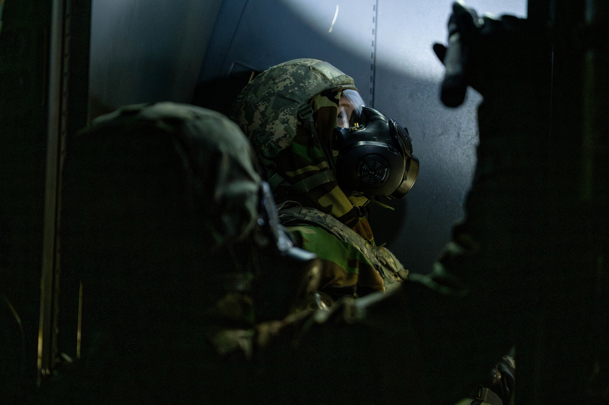 Airmen perform aircraft decontamination procedures during exercise Beverly Morning 25-2