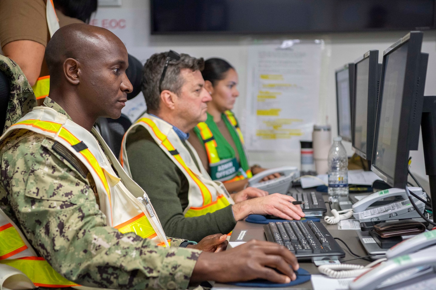 Aviation Boatswain’s Mate (Handling) 1st Class Washington Kivairu assigned to Naval Support Activity Souda Bay, Crete, Greece, responds to a simulated active shooter incident in the Emergency Operations Center during a Commander, Navy Installations Command Emergency Management Program Assessment (EMPA) onboard NSA Souda Bay on March 6, 2025.