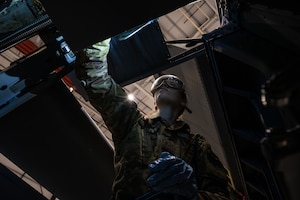 U.S. Air Force Senior Airman Grace Hall, 100th Maintenance Squadron crew chief, inspects gearboxes of a KC-135 Stratotanker for an isochronal inspection at RAF Mildenhall, England, March 5, 2025.