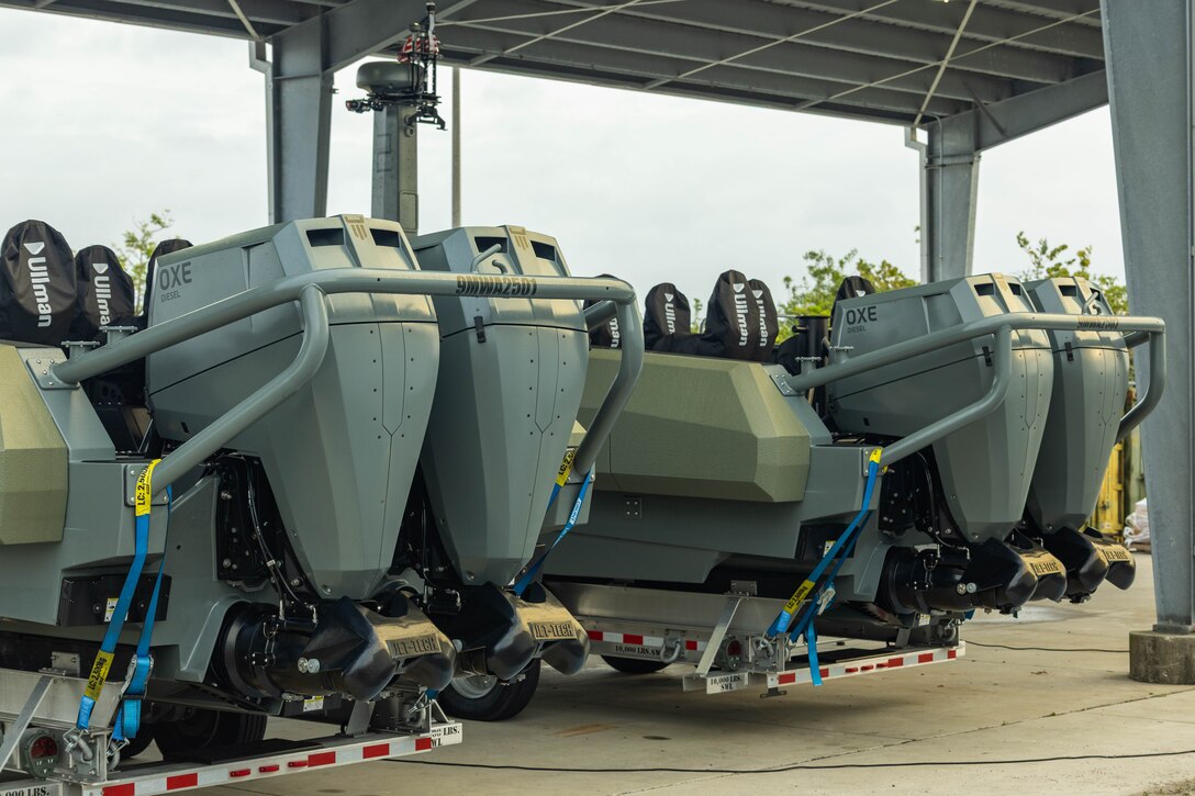 The U.S. Marine Corps multi-mission reconnaissance crafts–alpha variant–with 4th Assault Amphibian Battalion, 4th Marine Division, Marine Forces Reserve, are positioned on trailers for maintenance, Tampa, Florida, March 5, 2025. The MMRC-A is equipped with two, 300 horsepower turbo-diesel outboard motors, enabling Marines with 4th AABn to continue to train and operate in the maritime domain, supporting service level littoral maneuver concept development efforts. (U.S. Marine Corps photo by Lance Cpl. Van Hoang)