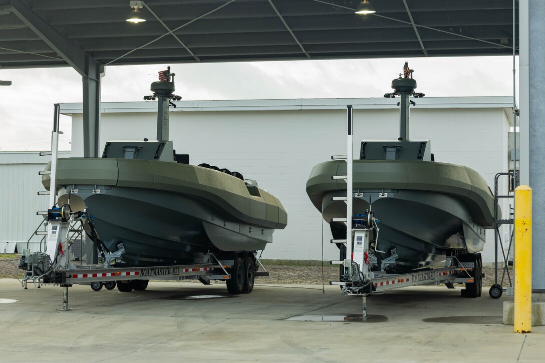 U.S. Marine Corps multi-mission reconnaissance crafts–alpha variant–with 4th Assault Amphibian Battalion, 4th Marine Division, Marine Forces Reserve, are positioned on trailers for maintenance, Tampa, Florida, March 5, 2025. The MMRC-A will enable Marines with 4th AABn to continue to train and operate in the maritime domain, supporting service level littoral maneuver concept development efforts. (U.S. Marine Corps photo by Lance Cpl. Van Hoang)