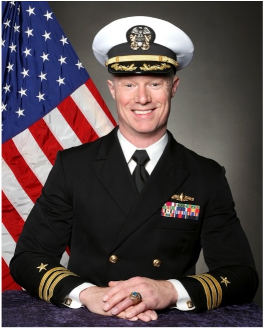 Cmdr. ALEX SMITH