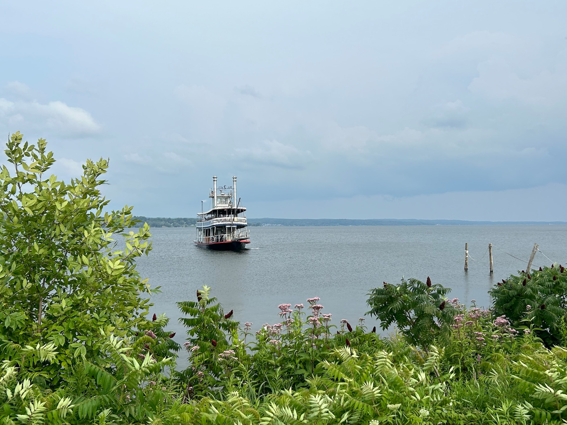 A ferry crosses a lake.
