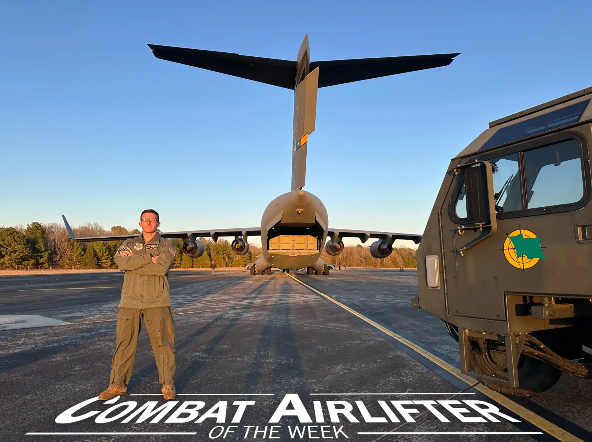 Man stands behind a C-17.