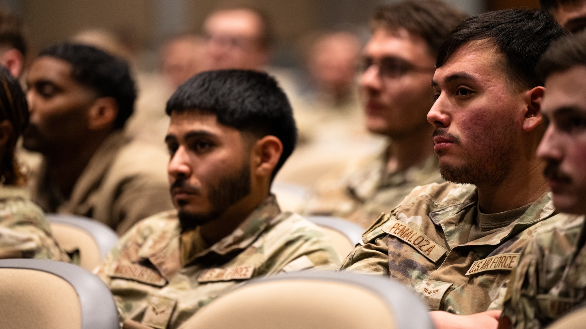 Airmen assigned to the 317th Airlift Wing listen to retired U.S. Air Force Chief Master Sgt. Anthony Brinkley during Warrior Heart Day at Dyess Air Force Base, Texas, March 5, 2025. Air Mobility Command’s Warrior Heart effort introduces the concept of training your mind and how it is integral to performance, well-being, and the ability to thrive through adversity. Brinkley empowered Airmen with the tools to maintain mission readiness with a warrior mindset. (U.S. Air Force photo by Airman 1st Class Jade M. Caldwell)
