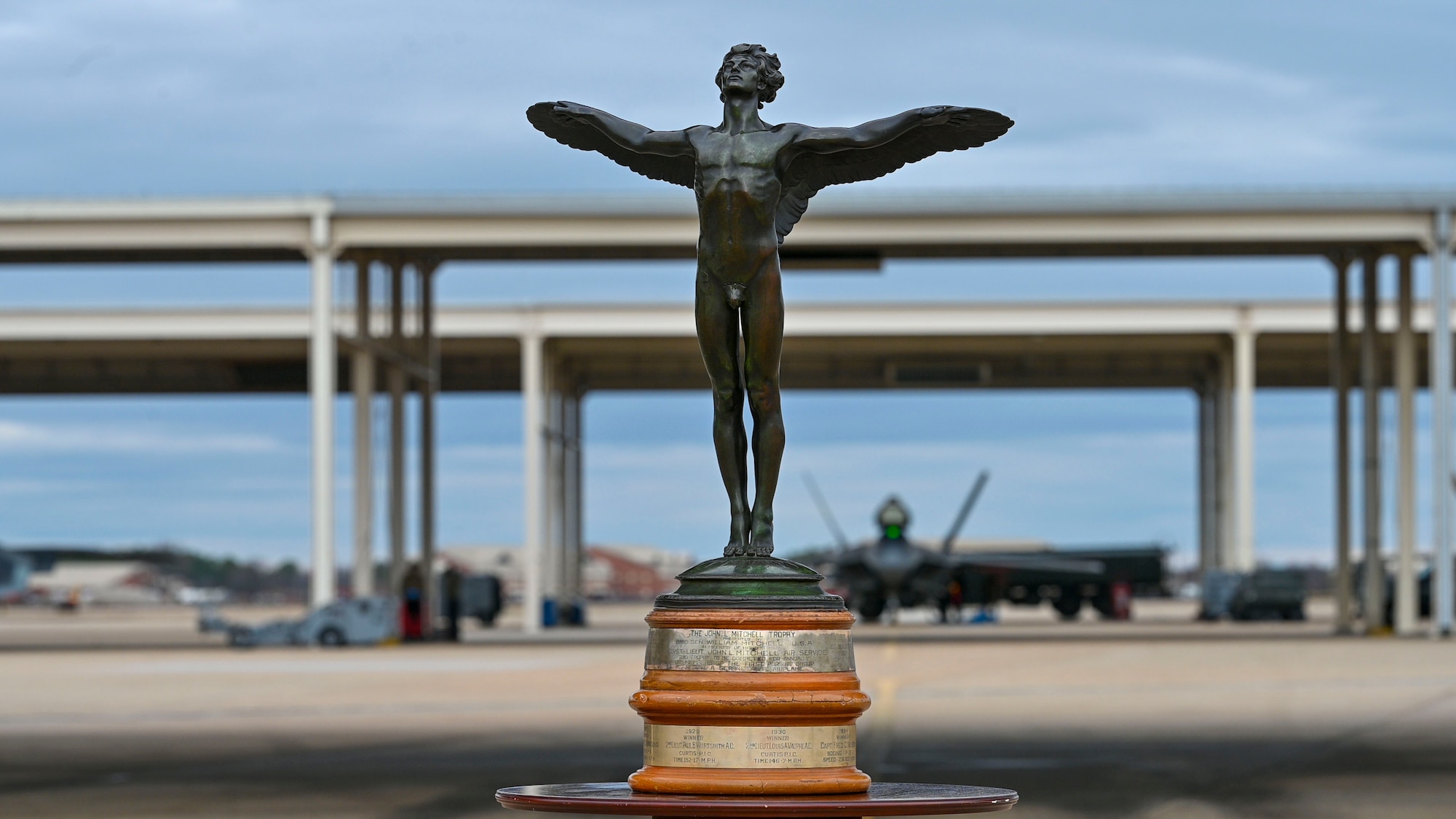 LANGLEY AIR FORCE BASE, Va. – The John Mitchell Trophy sits in front of the designated parking spot for the winner of the Mitchell Trophy Air Race at Langley Air Force Base, Virginia, Mar. 7, 2025. The trophy has not been presented for the race since 1936. The race was held with direct support from mission partners at the 127th Wing at Selfridge Air National Guard Base, Michigan, which is where the race began in 1922. (U.S. Air Force photo by Tech. Sgt. Matthew Coleman-Foster)