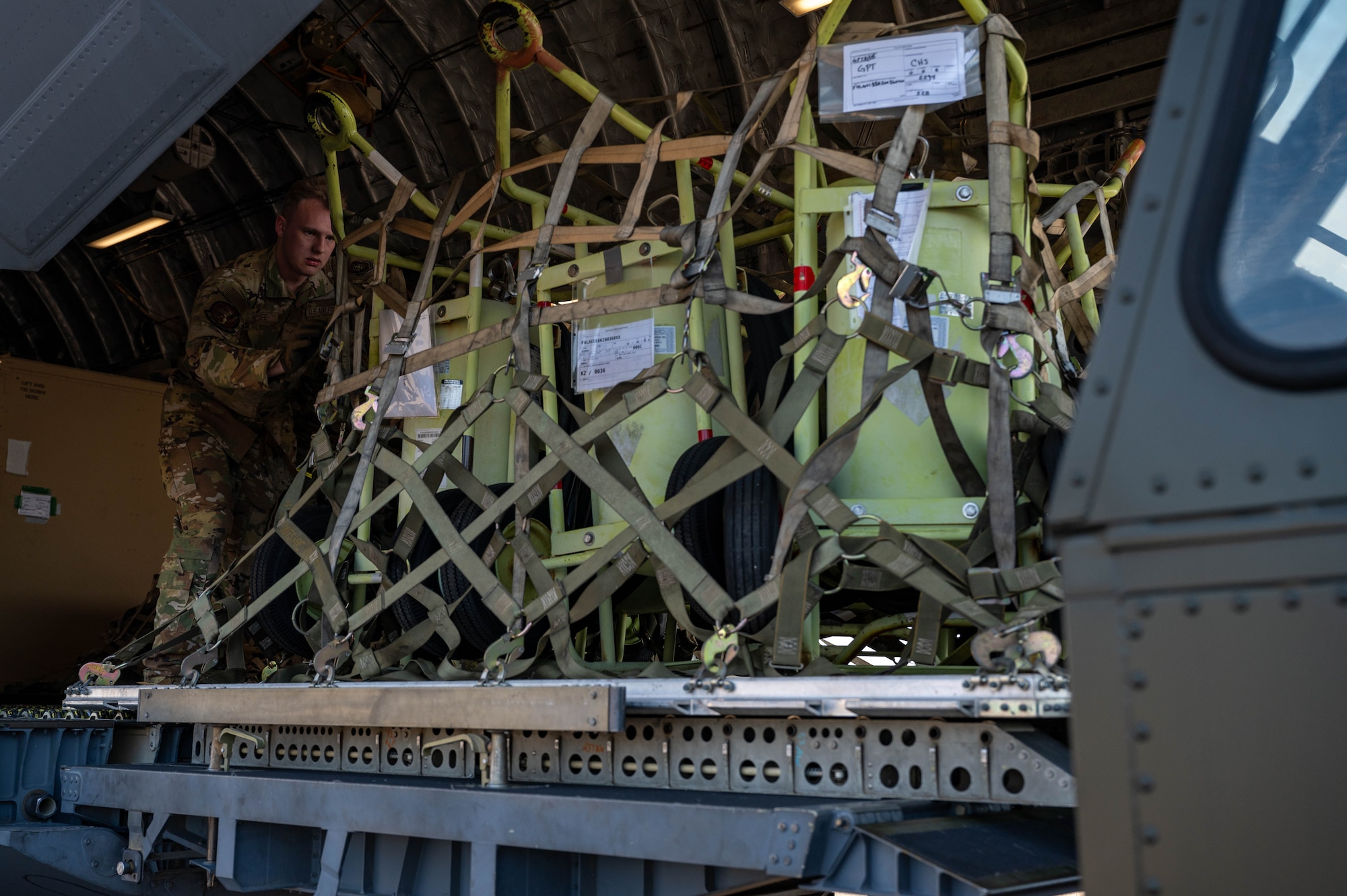 Airmen offload cargo from a C-17 Globemaster III