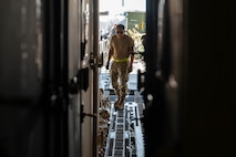 Airmen offload cargo from a C-17 Globemaster III