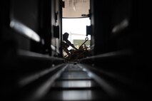 Airmen offload cargo from a C-17 Globemaster III