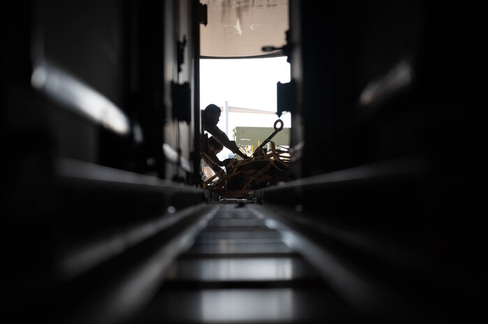 Airmen offload cargo from a C-17 Globemaster III