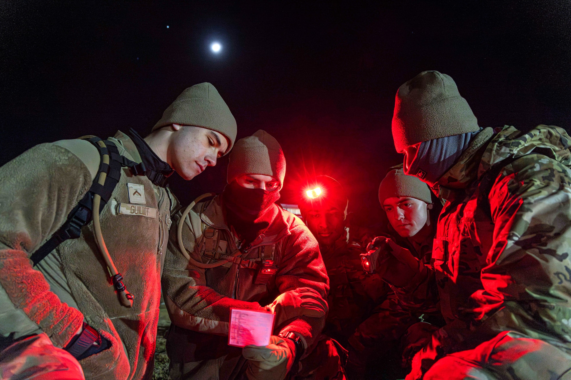 U.S. Air Force Academy cadets conduct nighttime operations during the 2025 Spring Culminating Exercise at the Academy, Colo., March 5, 2025. This exercise was designed to cultivate a warfighter mindset among cadets, ensuring they developed confidence in decision-making, physical and mental resilience, and realistic combat preparation. (U.S. Air Force photo by Trevor Cokley)