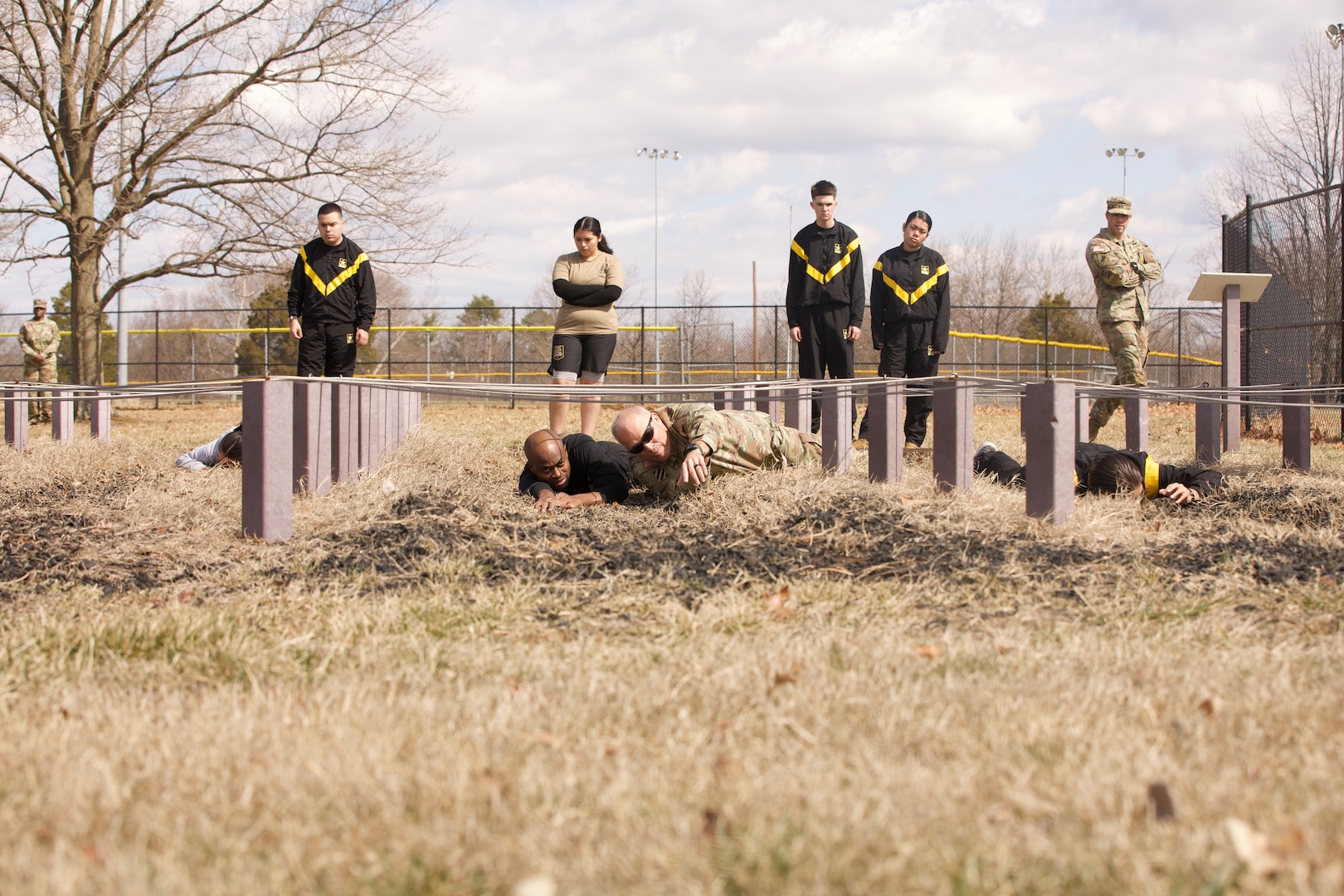 Army Brig. Gen. Leland Blanchard, adjutant general of the District of Columbia National Guard, guides soldiers from the Recruit Sustainment Program through a confidence-conditioning obstacle course at Fort Belvoir, Virginia on March 8, 2025. The Resilience Obstacle Course is designed to enhance soldiers' confidence while testing their physical, mental, and team-building skills.