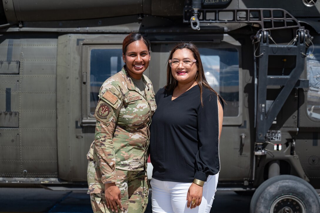 U.S. Air Force Staff Sgt. Karla Cartagena, 612th Air Base Squadron non-commissioned officer in charge of airfield management operations and training, poses for a photo with her aunt after her reenlistment ceremony at Soto Cano Air Base, Honduras, February 5, 2025.