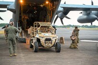 433rd Contingency Response Flight Citizen Airmen unload a tactical vehicle from a C-130J during Exercise NEXUS FORGE 2025