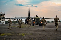 433rd Contingency Response Flight Citizen Airmen walk along the runway at Kalaeloa Airport, Hawaii during Exercise NEXUS FORGE