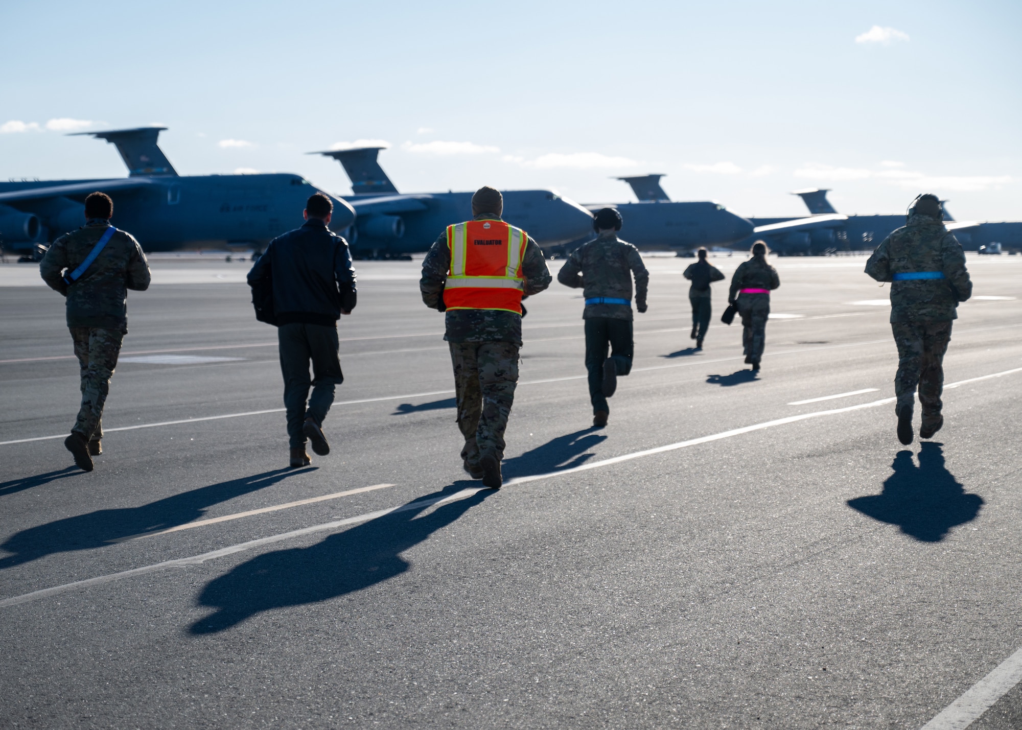 Air crew hustles toward aircraft
