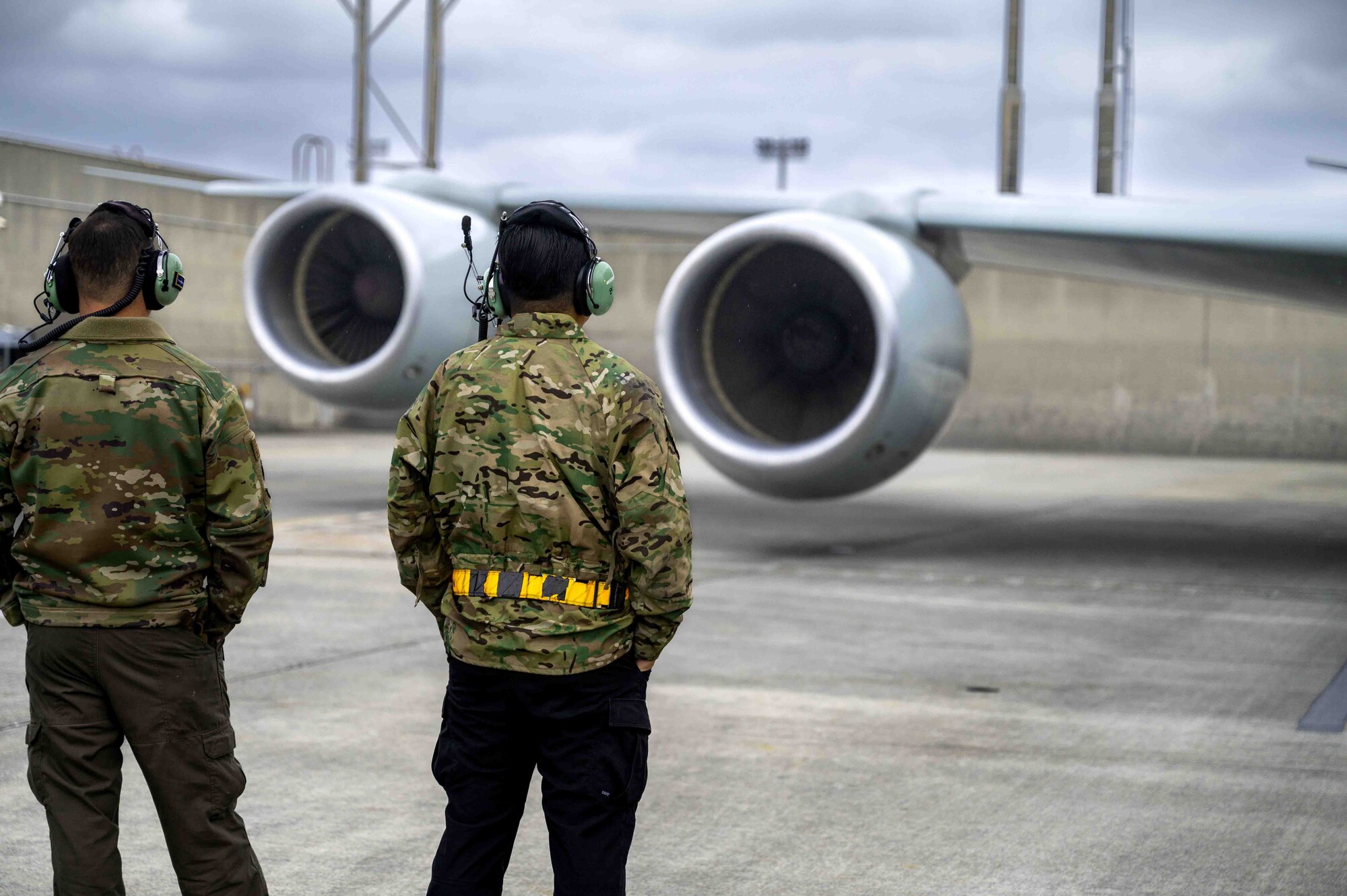 Airmen monitoring RC-135 engines