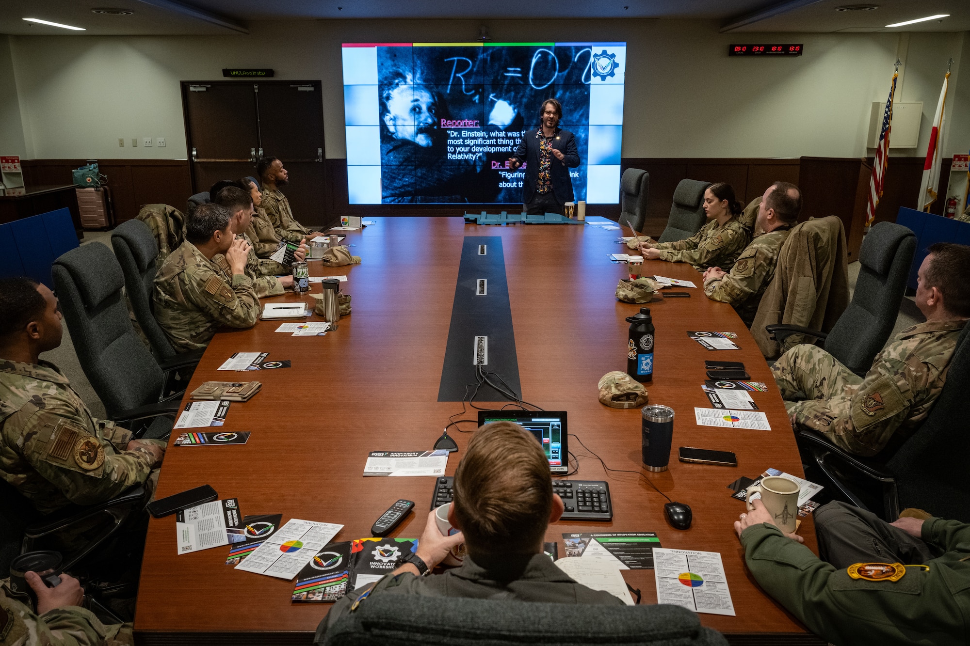 Dr. Ethan Eagle, Project Mercury head coach, briefs leadership at Misawa Air Base, Japan, March 7, 2025. Project Mercury is a USAF initiative focused on developing innovative solutions to enhance efficiency, strengthen operations, and improve mission readiness. (U.S. Air Force photo by Airman 1st Class Andre Medina)
