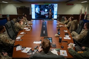 Dr. Ethan Eagle, Project Mercury head coach, briefs leadership at Misawa Air Base, Japan, March 7, 2025. Project Mercury is a USAF initiative focused on developing innovative solutions to enhance efficiency, strengthen operations, and improve mission readiness. (U.S. Air Force photo by Airman 1st Class Andre Medina)