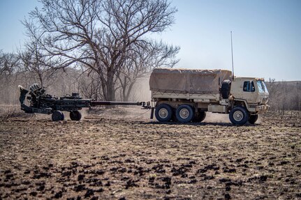 Field artillery Soldiers assigned to Charlie Battery, 1st Battalion, 160th Field Artillery Regiment, 45th Infantry Brigade Combat Team, Oklahoma Army National Guard, arrive at the battalion’s tactical assembly area during training at Fort Sill, Oklahoma, March 7, 2025. (Oklahoma National Guard photo by Anthony Jones)