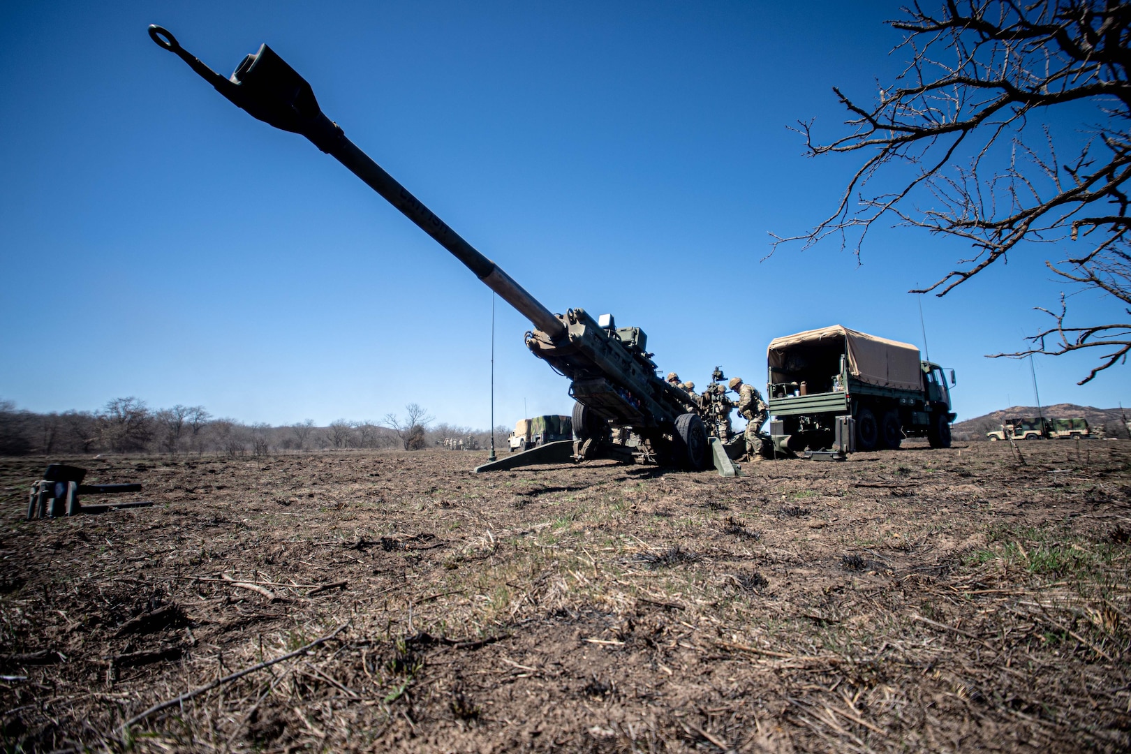 Field artillery Soldiers assigned to Charlie Battery, 1st Battalion, 160th Field Artillery Regiment, 45th Infantry Brigade Combat Team, Oklahoma Army National Guard, emplace an M777 howitzer during training at Fort Sill, Oklahoma, March 7, 2025. (Oklahoma National Guard photo by Anthony Jones)