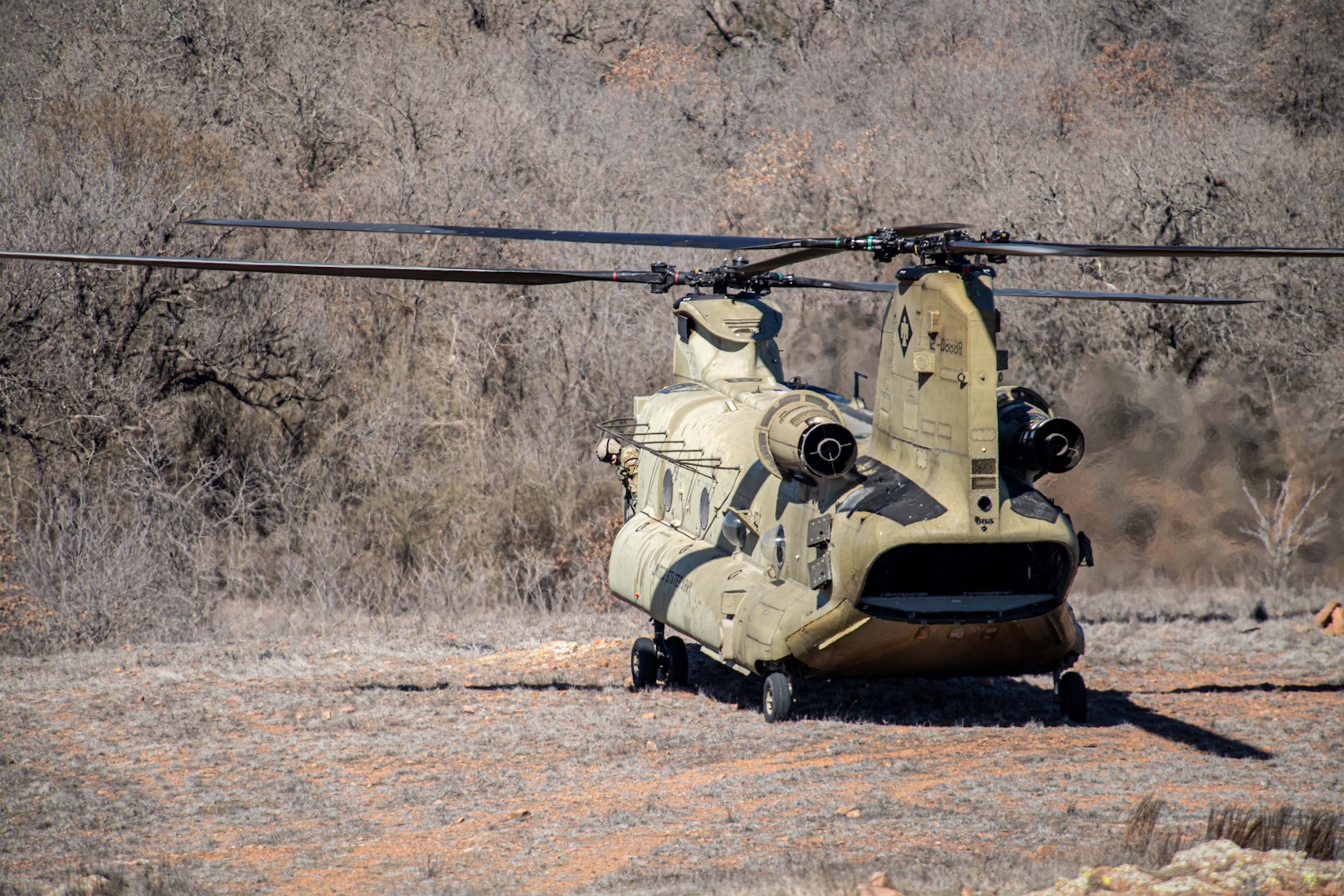 An Oklahoma Army National Guard CH-47 Chinook helicopter prepares to take off after dropping off forward observers assigned to the Oklahoma Army National Guard during training at Fort Sill, Oklahoma, March 7, 2025. (Oklahoma National Guard photo by Anthony Jones)