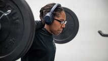 airman lifting weights