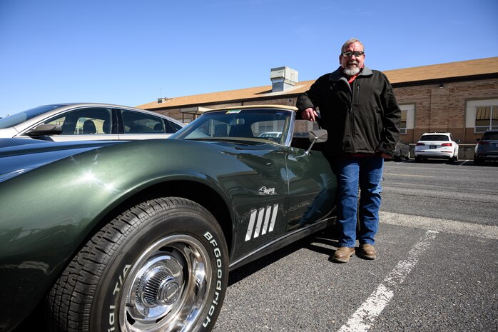 Meet this month's Ogden Air Logistics Complex spotlight employee, Tracy “Trace” Lloyd, flight chief for the 531st Commodities Maintenance Squadron at Hill Air Force Base. His with a 1969 Stingray Corvette convertible, a car he restored. (Photo by Ron Bradshaw)