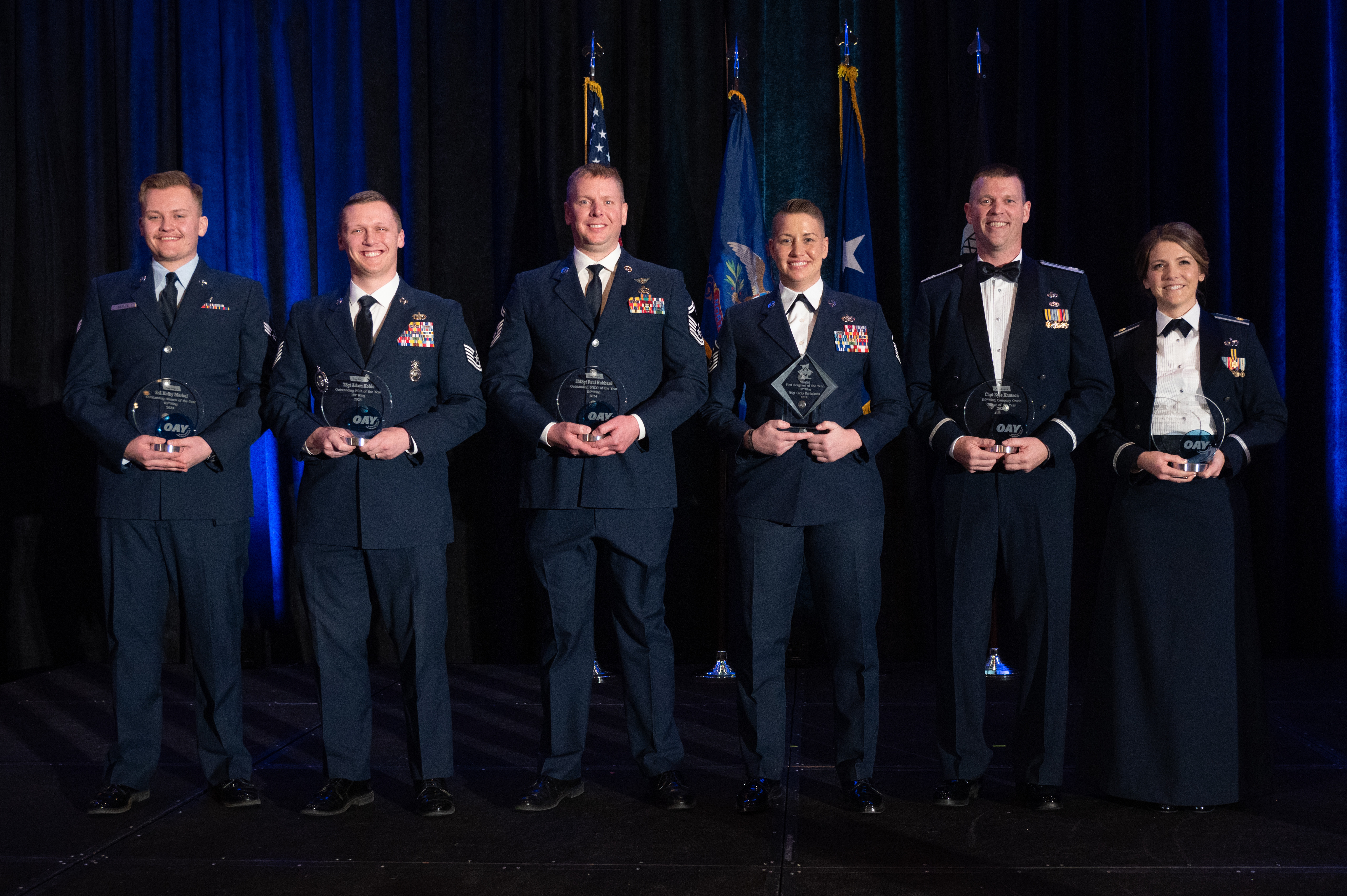 119th Wing Outstanding Airmen of the Year winners. (L-R) Senior Airman Kolby Merkel (Outstanding Airman), Technical Sgt.  Adam Kohls (Outstanding Non-Commissioned Officer), Senior Master Sgt. Paul Hubbard (Outstanding Senior Non-Commissioned Officer), Master Sgt. Lacey Bunkelman (Outstanding First Sergeant), Captain Kyle Knutson (Outstanding Company Grade Officer) and Major Kimberly Nelson (Outstanding Company Grade Officer).