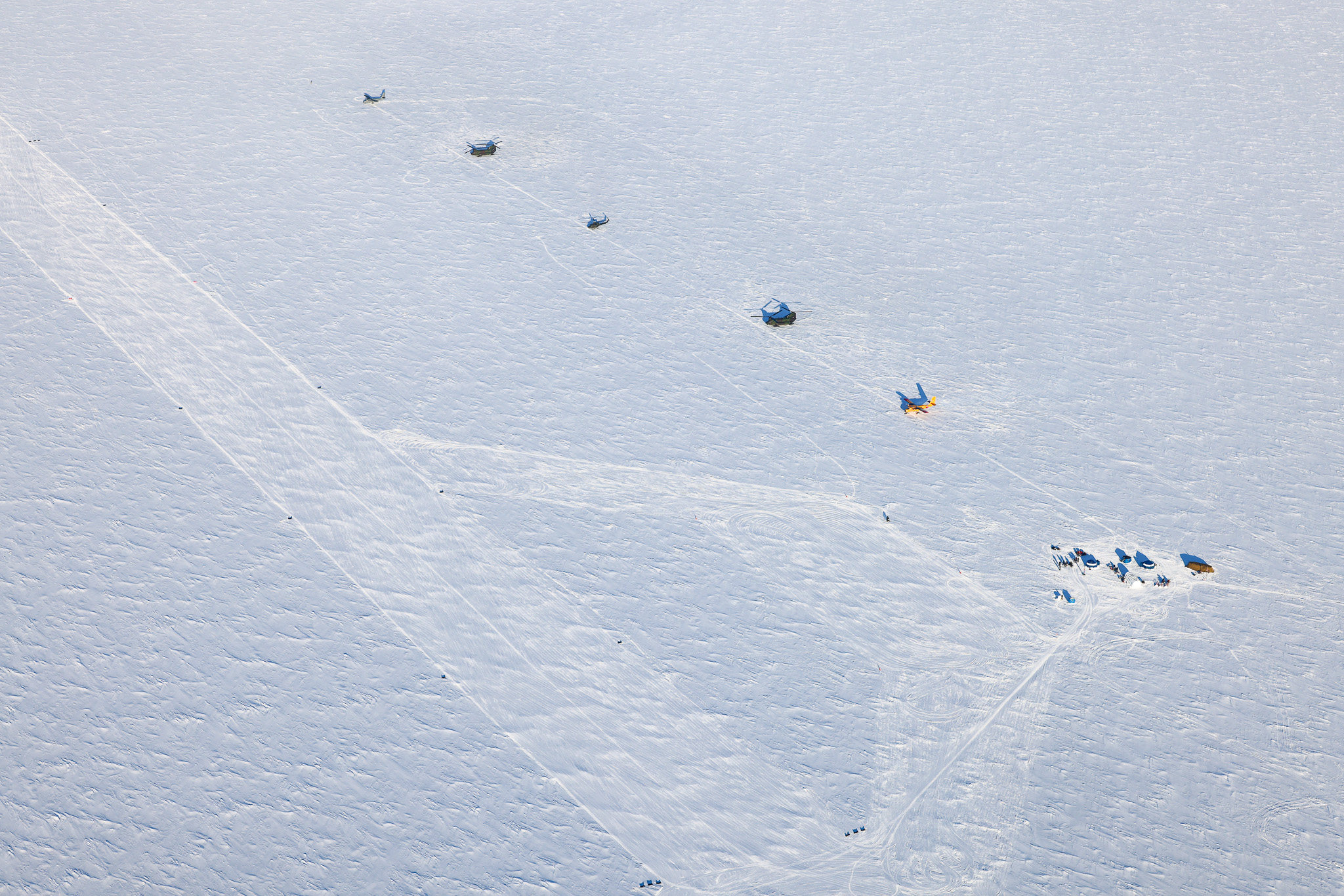 An aerial photo of the ski landing area and Arctic Camp on Parsons Lake, Northwest territories, Canada, March 4. A ski landing area allowed the LC-130 Hercules to land on snow and ice using skis. (U.S. Air National Guard photo by Staff Sgt. Jocelyn Tuller)