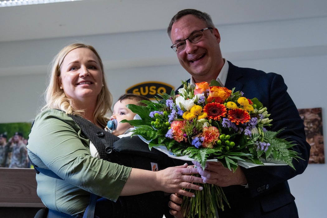 ZP-4 Sabrina Figueroa, 52nd Security Forces patrolman and Alexander Eberl-Loof, Marienhaus Eifel Clinic hospital supervisor, pose for a photo.
