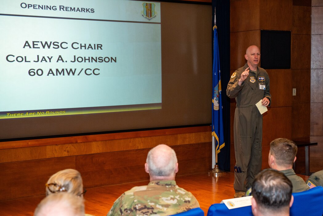 U.S. Air Force Col. Jay Johnson, 60th Air Mobility Wing commander, delivers opening remarks during the 2025 Aeromedical Evacuation Weapons Systems Council