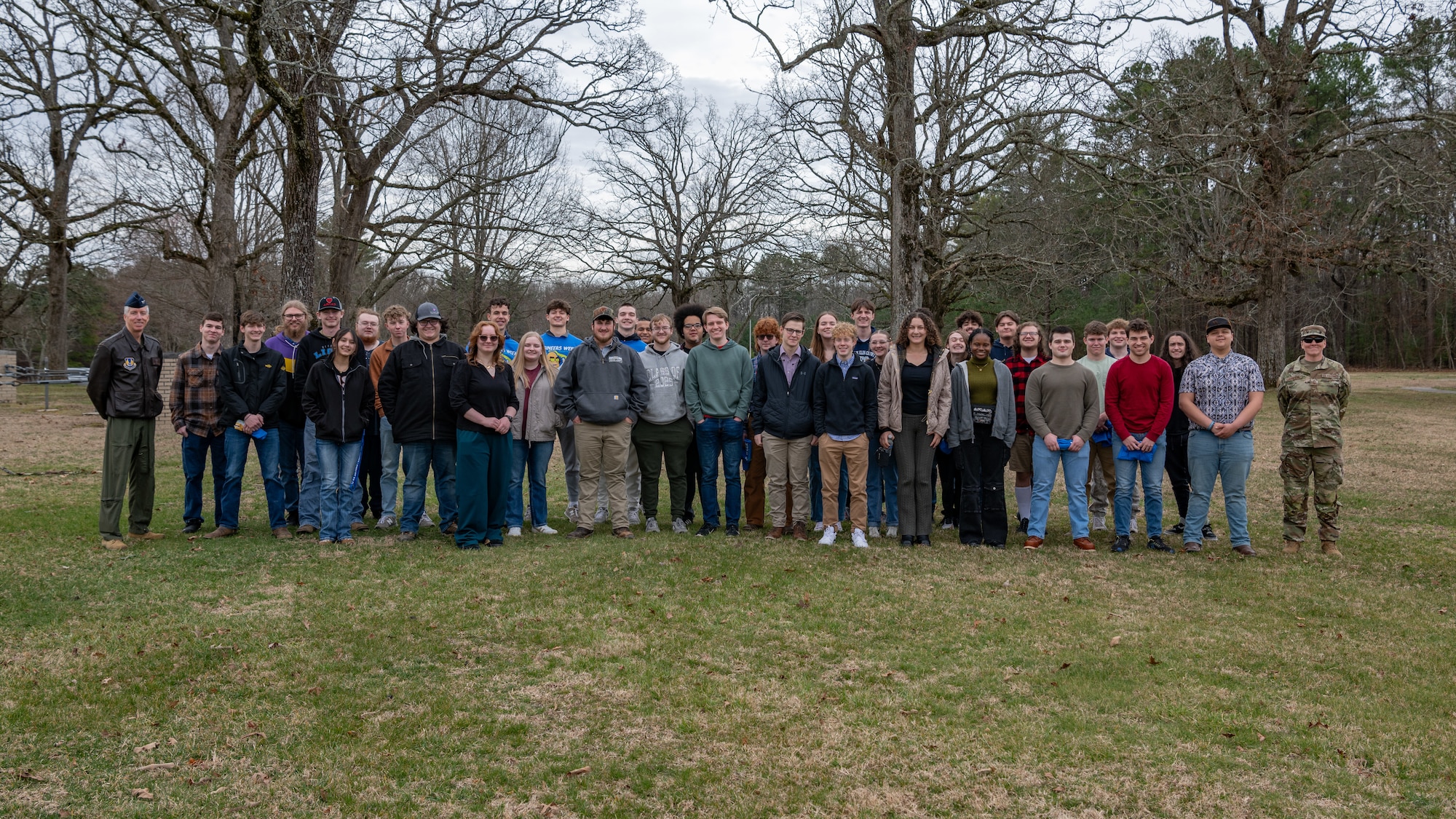 Forty high school students learned more about the engineering profession during the annual Engineer-For-A- Day event, March 7, 2025, at Arnold Air Force Base, headquarters of Arnold Engineering Development Complex. Both Col. Grant A. Mizell, commander of Arnold Engineering Development Complex, far left and CMSgt. Jennifer Cirricione, far right joined the students for a group picture following the conclusion of the base tour. (U.S. Air Force photo by Keith Thornburgh)