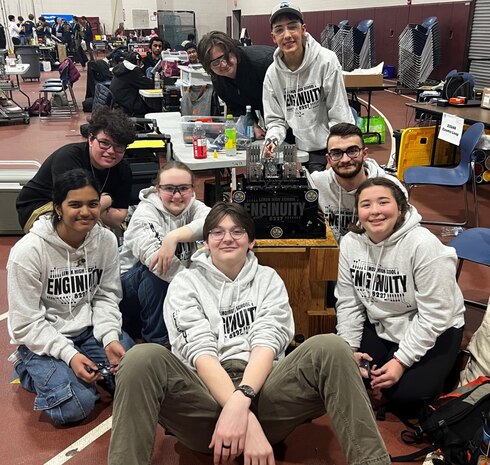 Lenox Memorial Middle and High School students pose together with their robot at the For Inspiration and Recognition of Science and Technology (FIRST) Tech Challenge in Northbridge, Mass., on March 1, 2025. FIRST is a global nonprofit organization that aims to prepare K-12 students for the future through team-based robotics programs. SSP has been able to reach local schools like Lenox Memorial Middle and High School (LMMHS) through its STEM Outreach Program, which includes supporting school participation in robotic competitions. SSP, which provides full life-cycle support to the sea-based leg of the U.S. nuclear triad, is headquartered in Washington, D.C., and has field activities and program offices across the U.S.