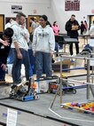 Students from Lenox Memorial Middle and High School (LMMHS) operate their robot at the For Inspiration and Recognition of Science and Technology (FIRST) Tech Challenge in Northbridge, Mass., on March 1, 2025. FIRST is a global nonprofit organization that aims to prepare K-12 students for the future through team-based robotics programs. SSP has been able to reach local schools like LMMHS through its STEM Outreach Program, which includes supporting school participation in robotic competitions. SSP, which provides full life-cycle support to the sea-based leg of the U.S. nuclear triad, is headquartered in Washington, D.C., and has field activities and program offices across the U.S.