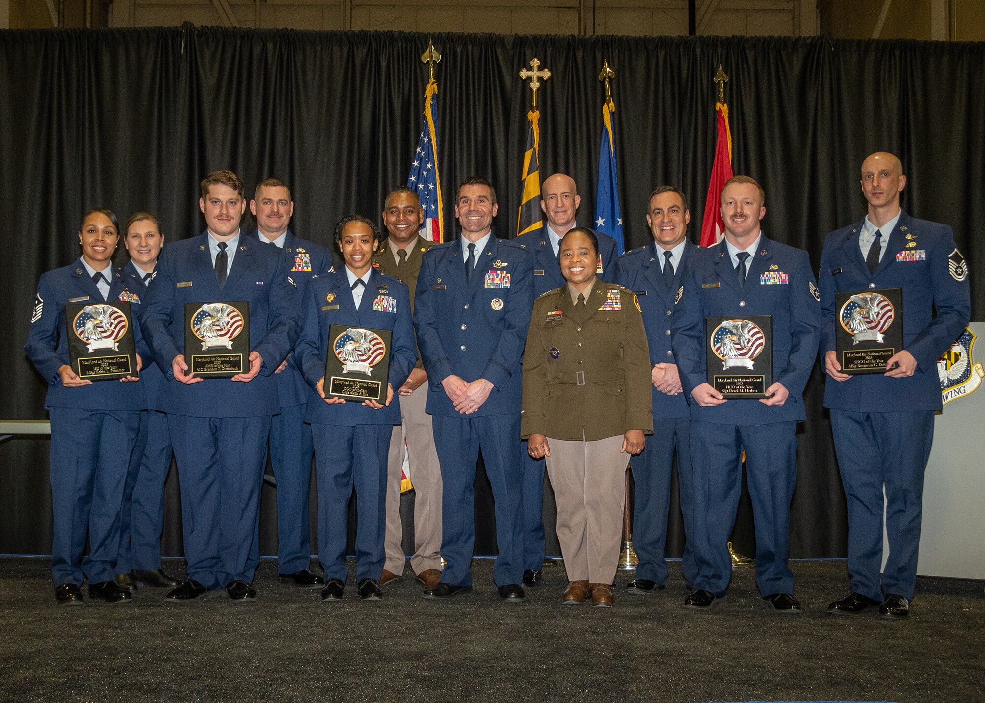 Maryland National Guard leaders and winners of the outstanding airmen awards pose for a group photo at the 175th Wing’s Airman Recognition Ceremony at Warfield Air National Guard Base at Martin State Airport, Maryland, January 12, 2025.