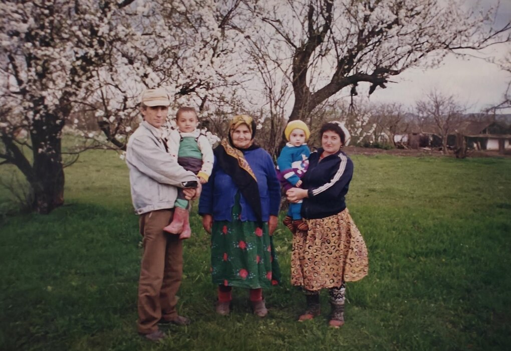 A family photo of Salchuk A. Gafurov Sr. (being held by his father) and his brother held by his mother as they pose with his late grandmother in Russia.