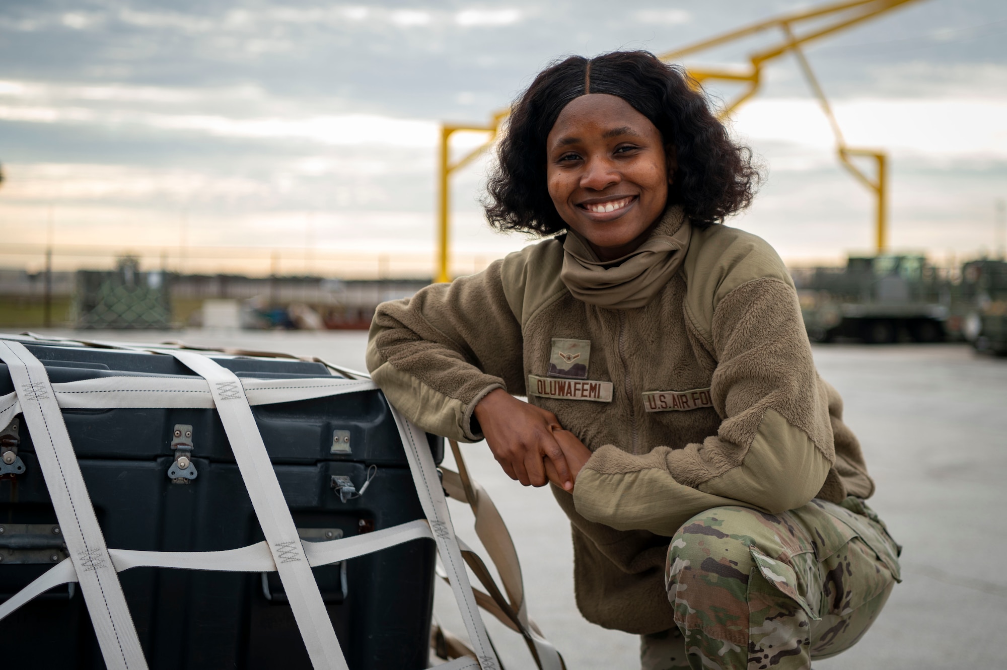 U.S. Air Force Airman Deborah Oluwafemi, an air transportation function apprentice assigned to the 6th Logistics Readiness Squadron, poses for a photo