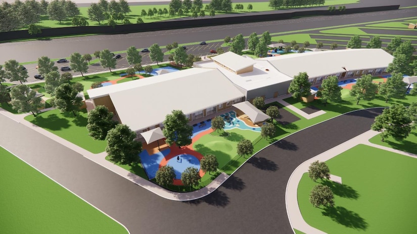 3D bird's-eye view of a building surrounded by landscaping and driveways.