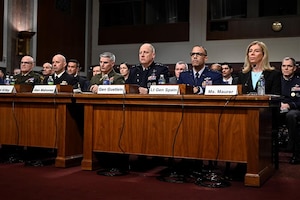 Service members speak at hearing.