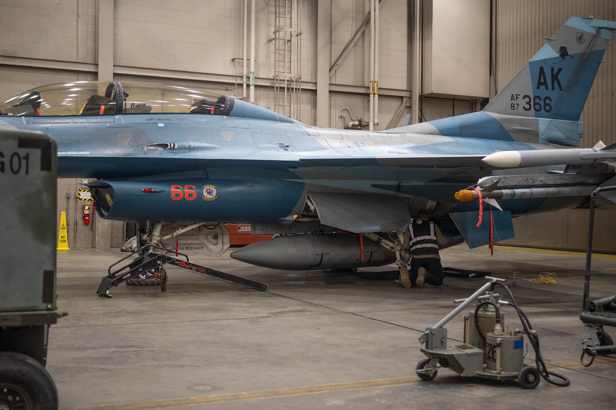U.S. Air Force Senior Airman Johnathan Ostroski, 18th Fighter Generation Squadron crew chief, replaces a brake pad on an F-16 Fighting Falcon at Eielson Air Force Base, Alaska, March 3, 2025.
